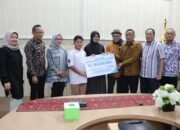 Dinas Kominfotik dan BPJS Ketenagakerjaan Serahkan Santunan Sosial kepada Keluarga Almarhum PTHL  Bandar